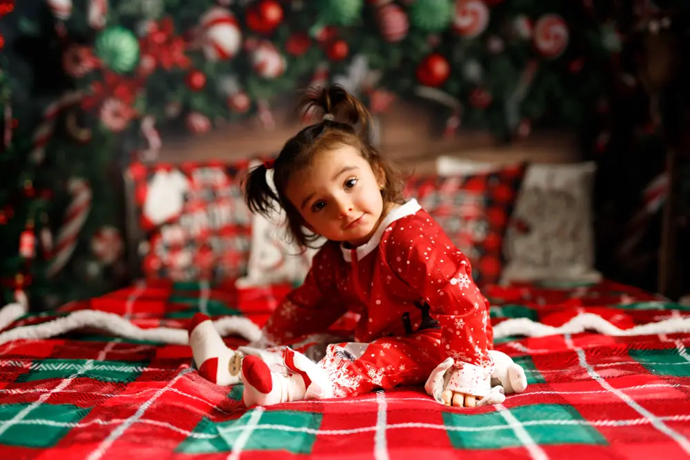 Séance photo de Noël Enfant Noël Famille Goncalves thème lit